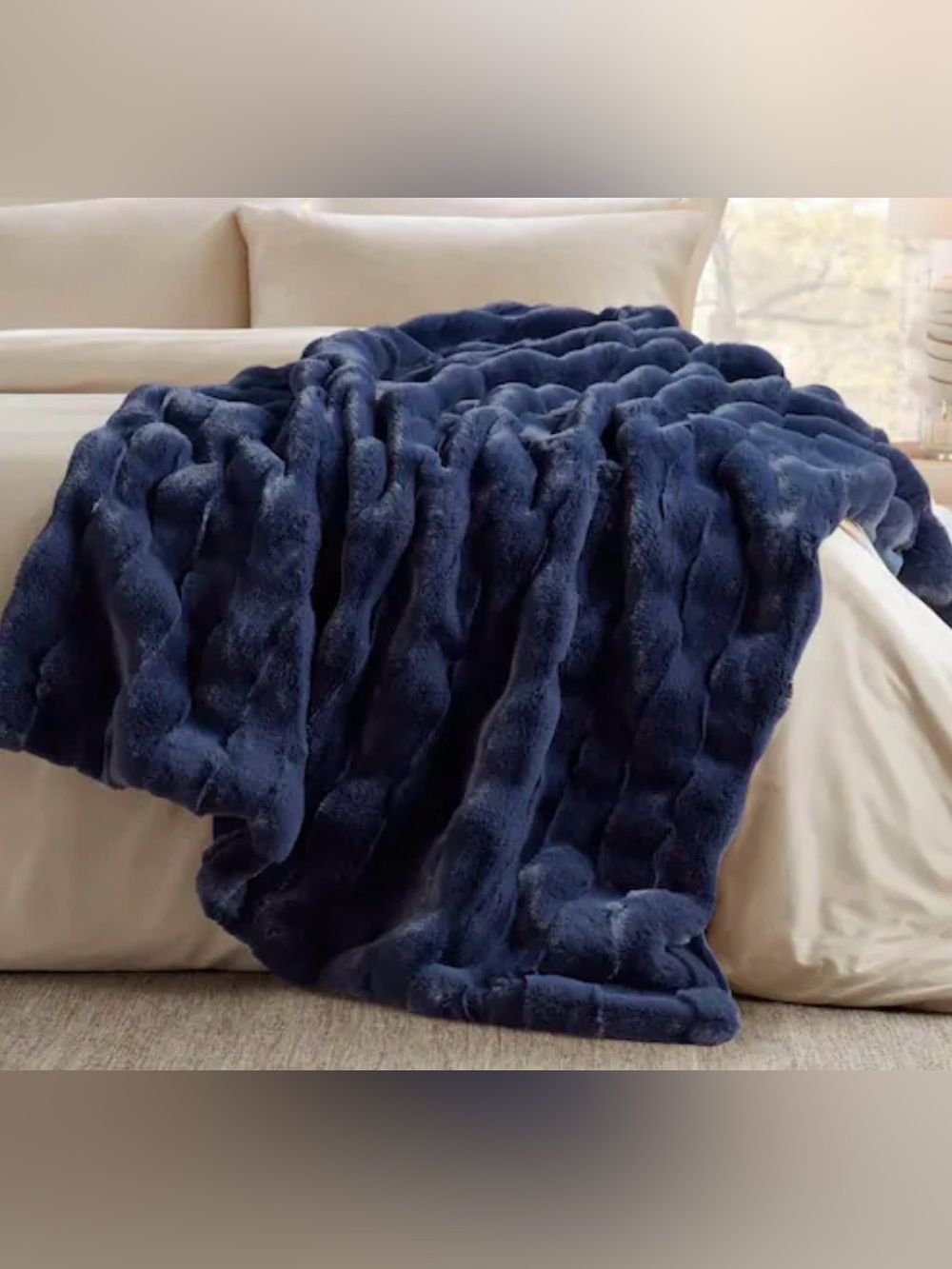 Indigo navy faux fur throw.